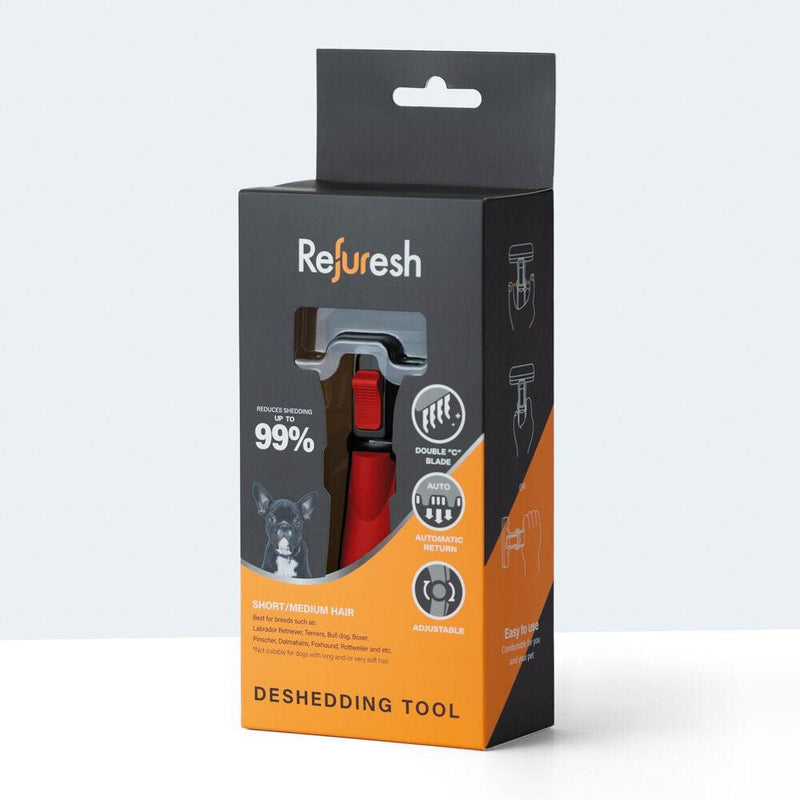 Refuresh Gentle Deshedding Brush for Short and Medium Hair, used on an English Springer Spaniel's jacket to remove loose undercoat